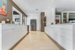 Expansive kitchen renders utmost cooking space for the family chef